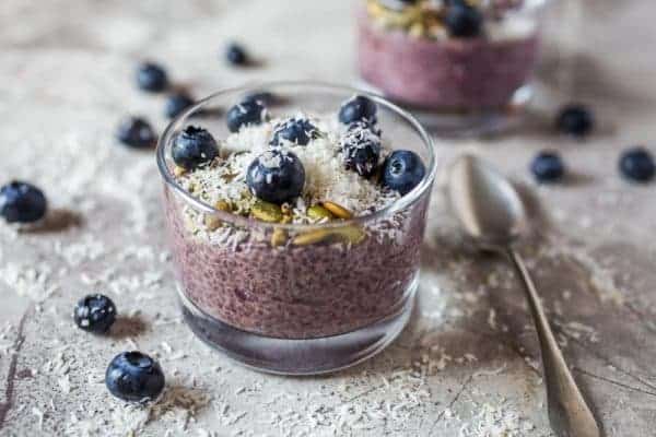 Easy Chia Seed Pudding made with mixed berries and topped with pumpkin seeds